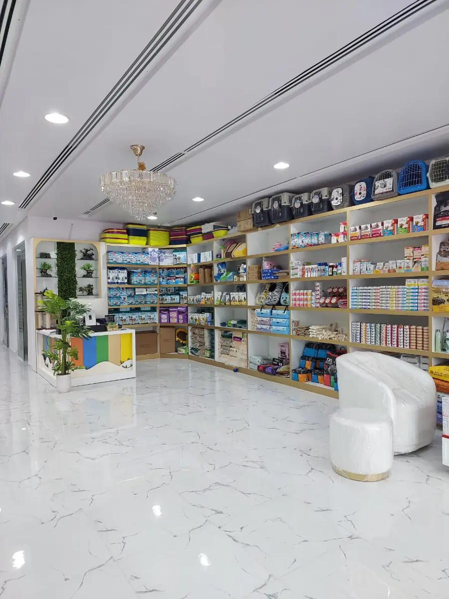 Shelves of pet food, treats and accessories inside the Petlove shop